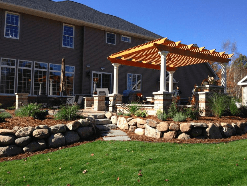 Stone Wall & Pergola backyard landscape design - Reder Landscaping, Midland MI